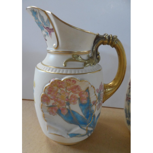 189 - Pair of Royal Worcester jugs, circa 1892, shape number 1437, height 16 cm,

Condition - both jugs ap... 