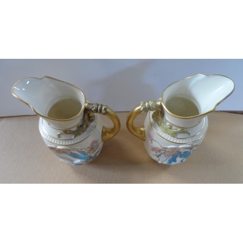189 - Pair of Royal Worcester jugs, circa 1892, shape number 1437, height 16 cm,

Condition - both jugs ap... 