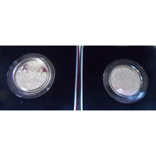 235 - Two cased Royal Mint 1983 silver proof £1 coins (2)