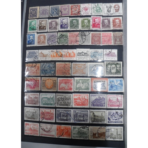 255 - 3 albums of world stamps to include Canada QV-QEII, early Greece and other countries as well as used... 