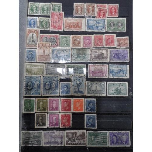 255 - 3 albums of world stamps to include Canada QV-QEII, early Greece and other countries as well as used... 