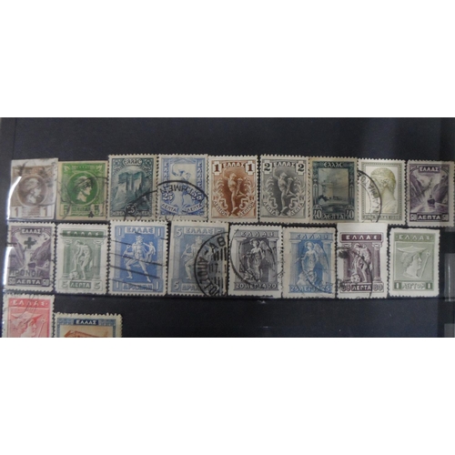 255 - 3 albums of world stamps to include Canada QV-QEII, early Greece and other countries as well as used... 