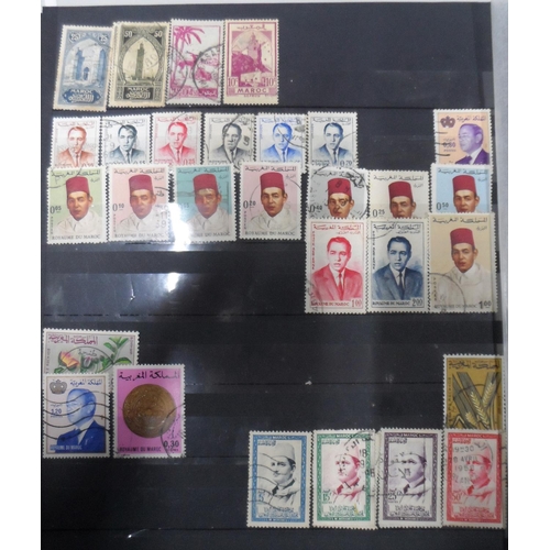 255 - 3 albums of world stamps to include Canada QV-QEII, early Greece and other countries as well as used... 