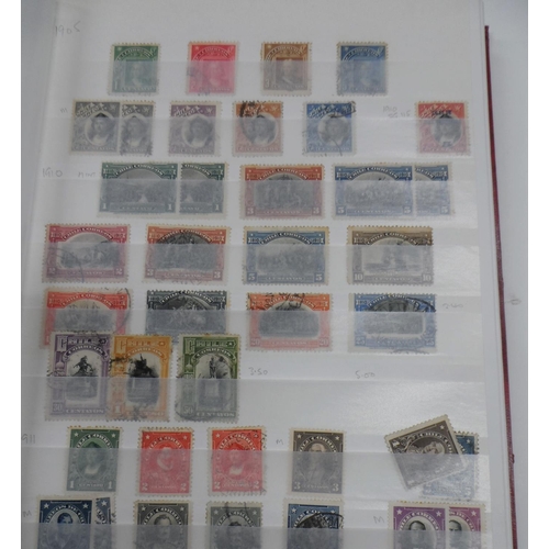 256 - Red world album mainly with South & central American with many early examples and high value early i... 