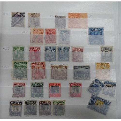 256 - Red world album mainly with South & central American with many early examples and high value early i... 