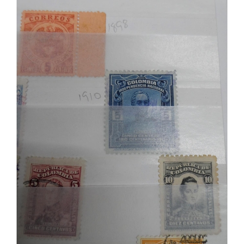 256 - Red world album mainly with South & central American with many early examples and high value early i... 