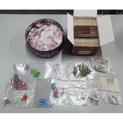 262 - Collection of Nostalgia postcards (box full) together with a large tin of used Belgium 3 franc stamp... 