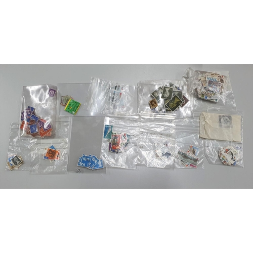 262 - Collection of Nostalgia postcards (box full) together with a large tin of used Belgium 3 franc stamp... 