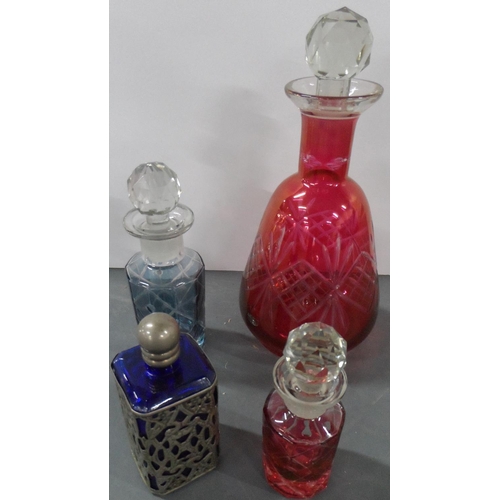 211 - Three Victorian scent bottles together with a fine quality antique cranberry glass decanter (4)