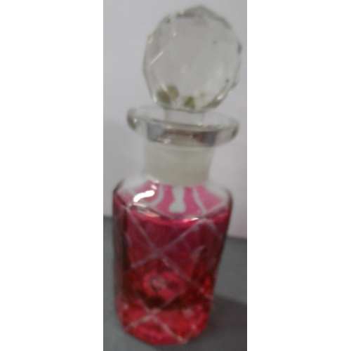 211 - Three Victorian scent bottles together with a fine quality antique cranberry glass decanter (4)