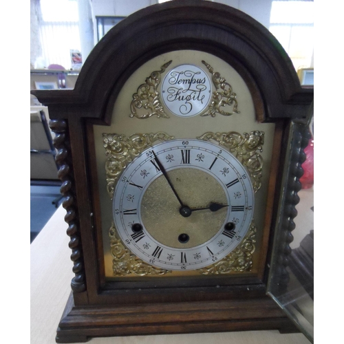 207 - Tempus fugit wooden cased mantle clock,

35 cm tall

No key