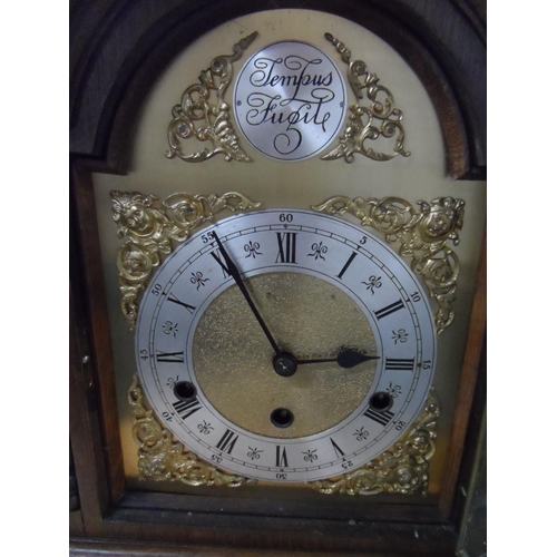 207 - Tempus fugit wooden cased mantle clock,

35 cm tall

No key