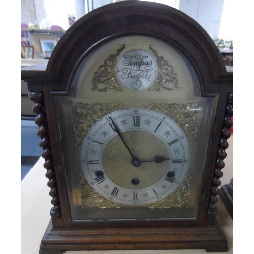 207 - Tempus fugit wooden cased mantle clock,

35 cm tall

No key