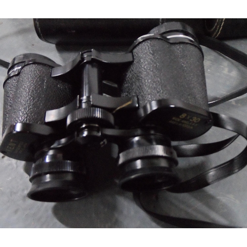 8 - Pair of Tasco 8 x 40 cased binoculars together with another vintage pair of 8 x 30 cased binoculars ... 