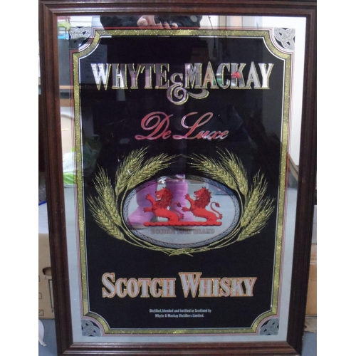 223 - Whyte & MacKay, Scotch whiskey advertising mirror in oak frame,

The mirror measures 80 x 52 cm