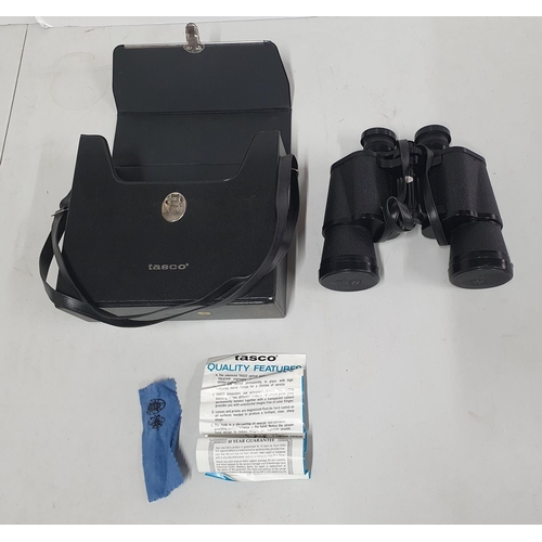 40A - Pair of Tasco 10 x 50 binoculars together with case etc