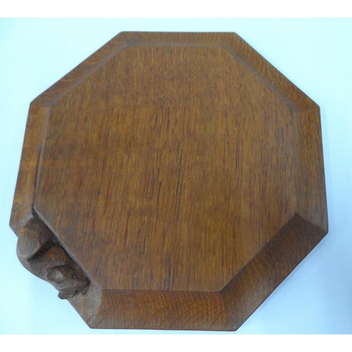 47 - Mid 20thC Mouseman tea-pot stand,

20 x 20 cm