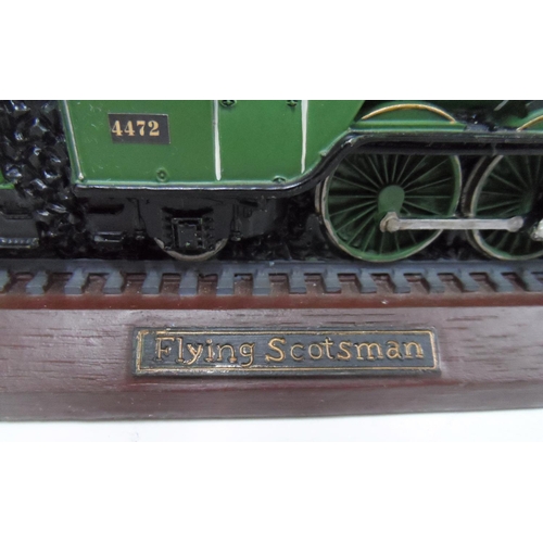 15 - Made from British coal is this hand-painted model of the Flying Scotsman,

30 cm long