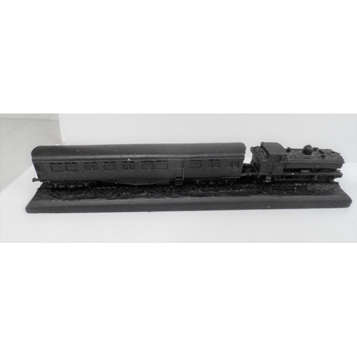 19 - Four models of steam trains made from British coal, including the Battle of Britain, the 