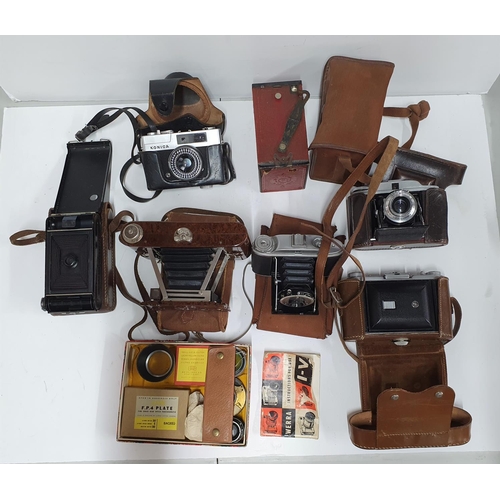 34 - Collection of vintage 20thC cased cameras to include Kershaw & Konica examples together with a small... 