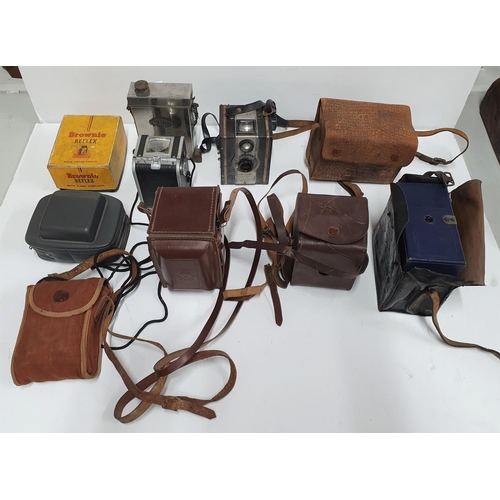 35 - Collection of vintage, early/mid 20thC cased cameras to include Kodac Brownie & Reflex, Ensign & Gen... 