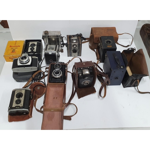 35 - Collection of vintage, early/mid 20thC cased cameras to include Kodac Brownie & Reflex, Ensign & Gen... 