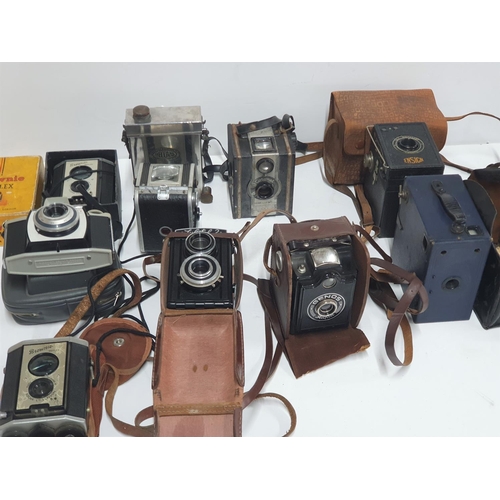 35 - Collection of vintage, early/mid 20thC cased cameras to include Kodac Brownie & Reflex, Ensign & Gen... 