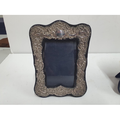 60 - Edwardian hallmarked silver photo frame together with another similar, unmarked example (2)