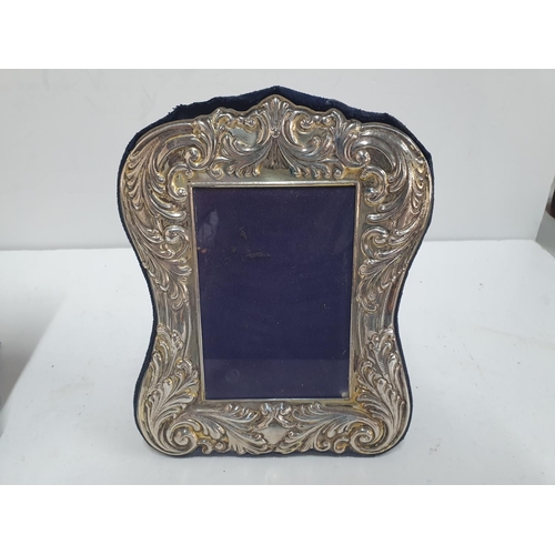 60 - Edwardian hallmarked silver photo frame together with another similar, unmarked example (2)