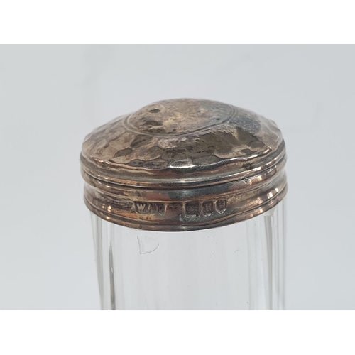 61 - Hallmarked silver power jar together with 3 silver topped jars (4)