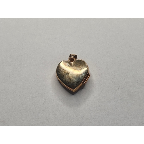 84 - 9ct yellow gold heart shaped pendant, inscribed 