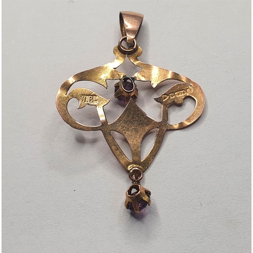 86 - 9ct yellow gold Art Nouveau style ladies pendent set with 2 red stones, 1.1 grams gross