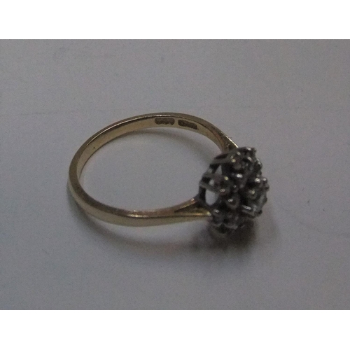 91 - 14ct yellow gold CZ cluster ring

approx 2.2 grams gross,            size M