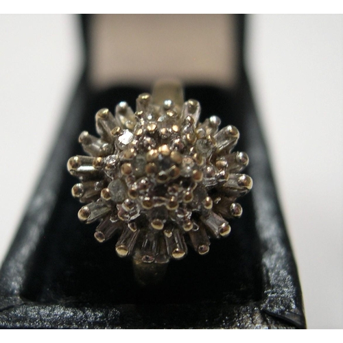 95 - 9ct yellow gold, diamond cluster ring

Approx 2.4 grams gross,              size H