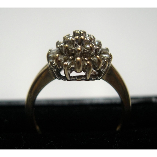 95 - 9ct yellow gold, diamond cluster ring

Approx 2.4 grams gross,              size H