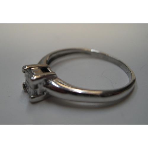 96 - 18ct white gold & diamond ring with 4 princess cut diamonds, rubbed marks.

Approx 2.7 grams gross, ... 