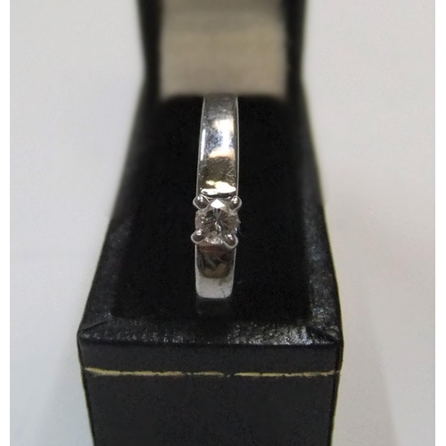 98 - 9ct white gold, diamond solitaire ring

Approx 2.8 grams gross,           size N