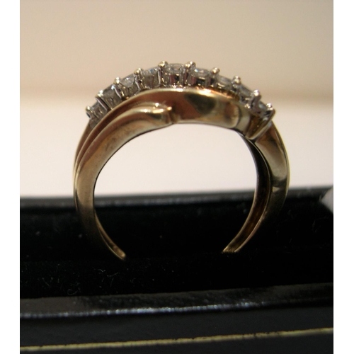 125 - 9ct yellow gold ring set with approx 38 diamonds, total weight approx 0.45ct.

The central row consi... 