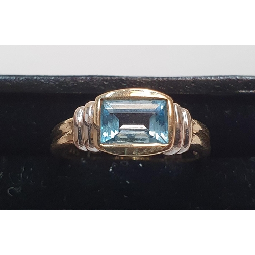 132 - 9ct yellow gold and topaz ring

Approx gross weight 2.7 grams,        Size L