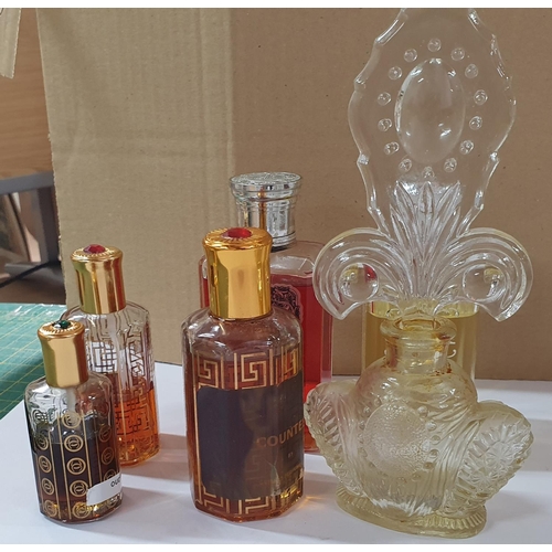 40 - Collection of mainly middle-eastern perfume bottles and oils (6)