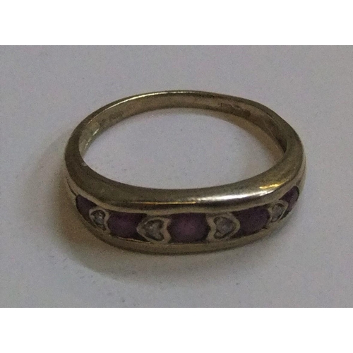 437 - 9ct yellow gold ring with round cut rubies interspersed with diamonds 

approx 2.3 grams gross,     ... 