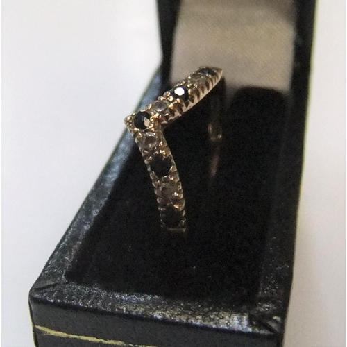 445 - 9ct yellow gold wishbone ring with white & blue stone ring

Approx 1.2 grams gross,             size... 