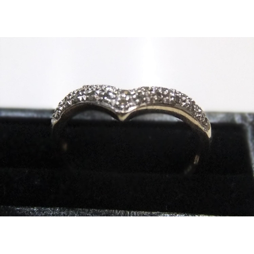 446 - 9ct yellow gold, diamond wishbone ring

Approx 2 grams gross,           size P