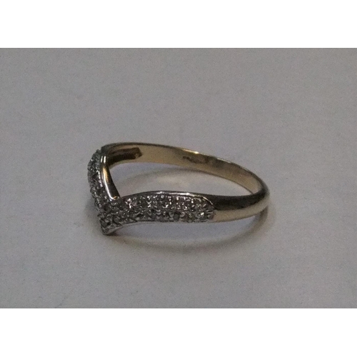 446 - 9ct yellow gold, diamond wishbone ring

Approx 2 grams gross,           size P
