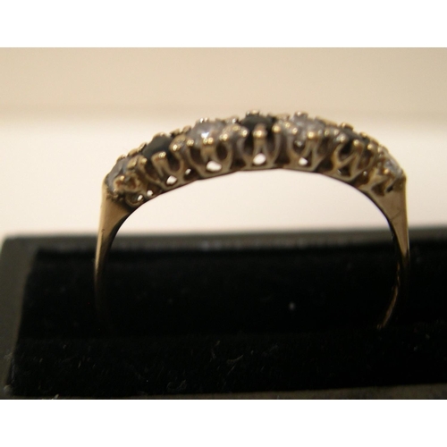 450 - 9ct yellow gold, half eternity ring with sapphire & clear stone ring

Approx 1.1 grams gross,       ... 