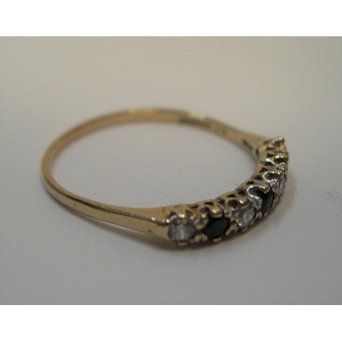 450 - 9ct yellow gold, half eternity ring with sapphire & clear stone ring

Approx 1.1 grams gross,       ... 