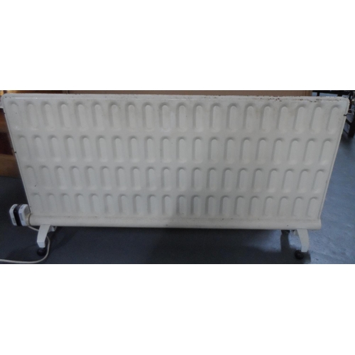 527 - Large plug-in electric radiator on wheels 75 x 138 cm