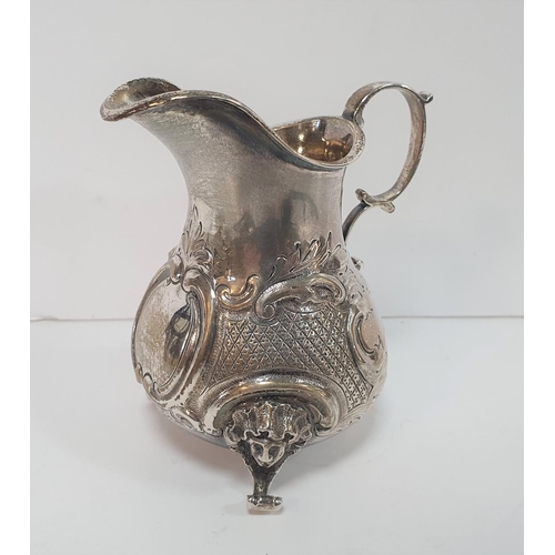 2 - Ornate antique silver cream jug, London 1853,

10 cm tall,        129 grams