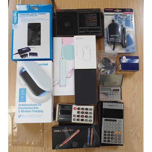 46 - Collection of calculators, hand warmers, adabtors etc (lot)