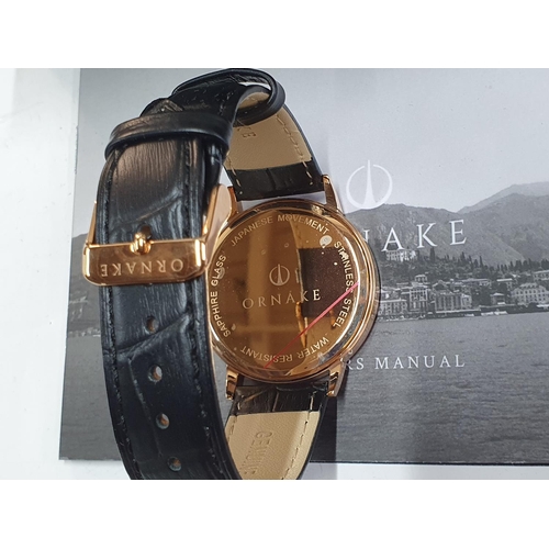 88 - Ornake  gents rose gold watch & leather strap complete with box & papers